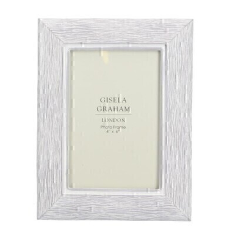 Grey Resin Wood 4x6 Picture Frame By Gisela Graham This grey resin picture frame fits a 4x6inch photo. Made by London based designer Gisela Graham who designs really beautiful gifts for your home and garden.  This photo frame would suit any home decor and would make a lovely gift. Matching smaller photo frame also available.